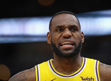 LeBron James #23 of the Los Angeles Lakers talks with a teammate during a game against the Chicago Bulls at the United Center on March 12, 2019 in Chicago, Illinois.