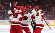 Sebastian Aho #20 of the Carolina Hurricanes celebrates